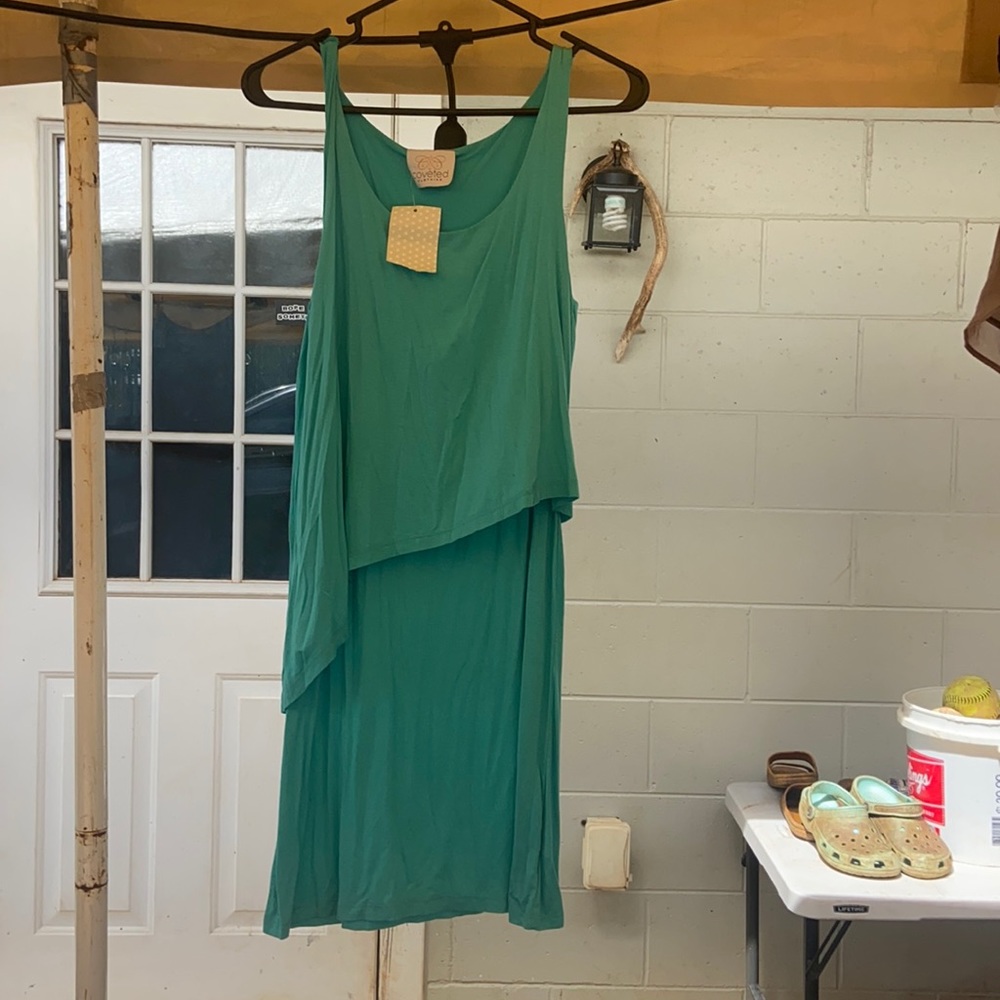 Women’s Turquoise size Medium dress brand new never used with tags still on